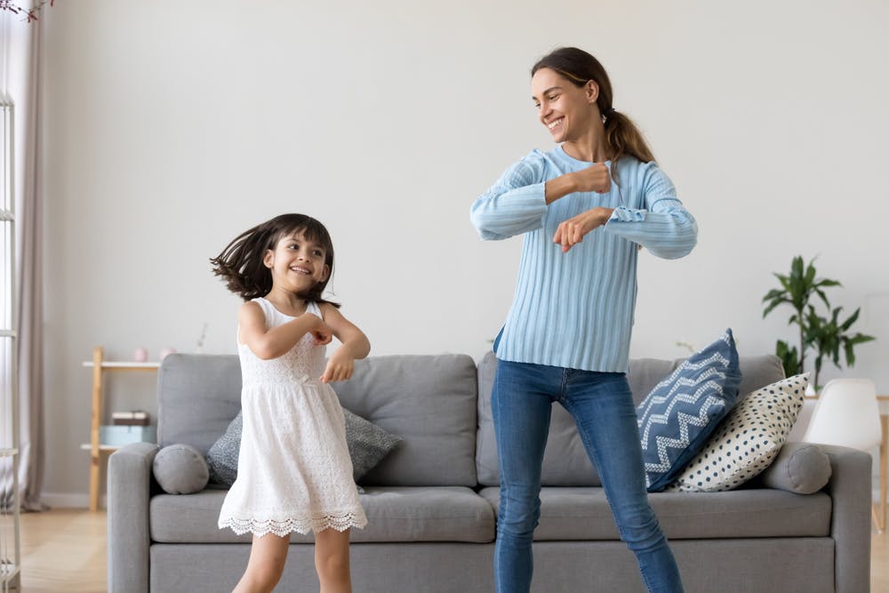 mum and daughter dancing